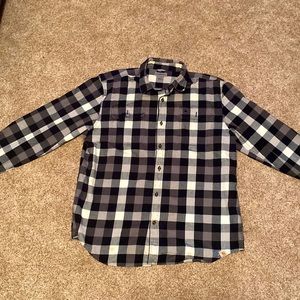 A Carhart black and white button up flannel